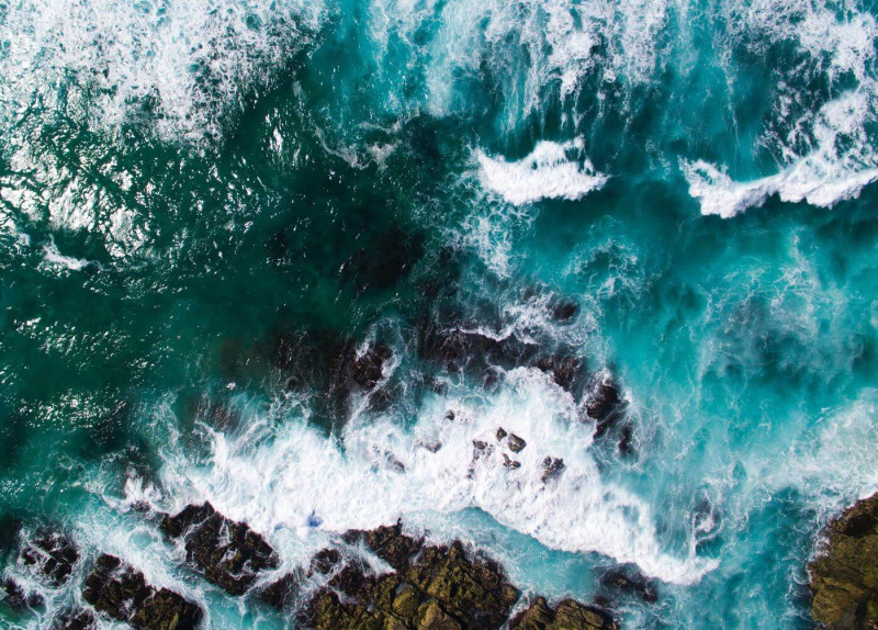 Waves crashing on rocks